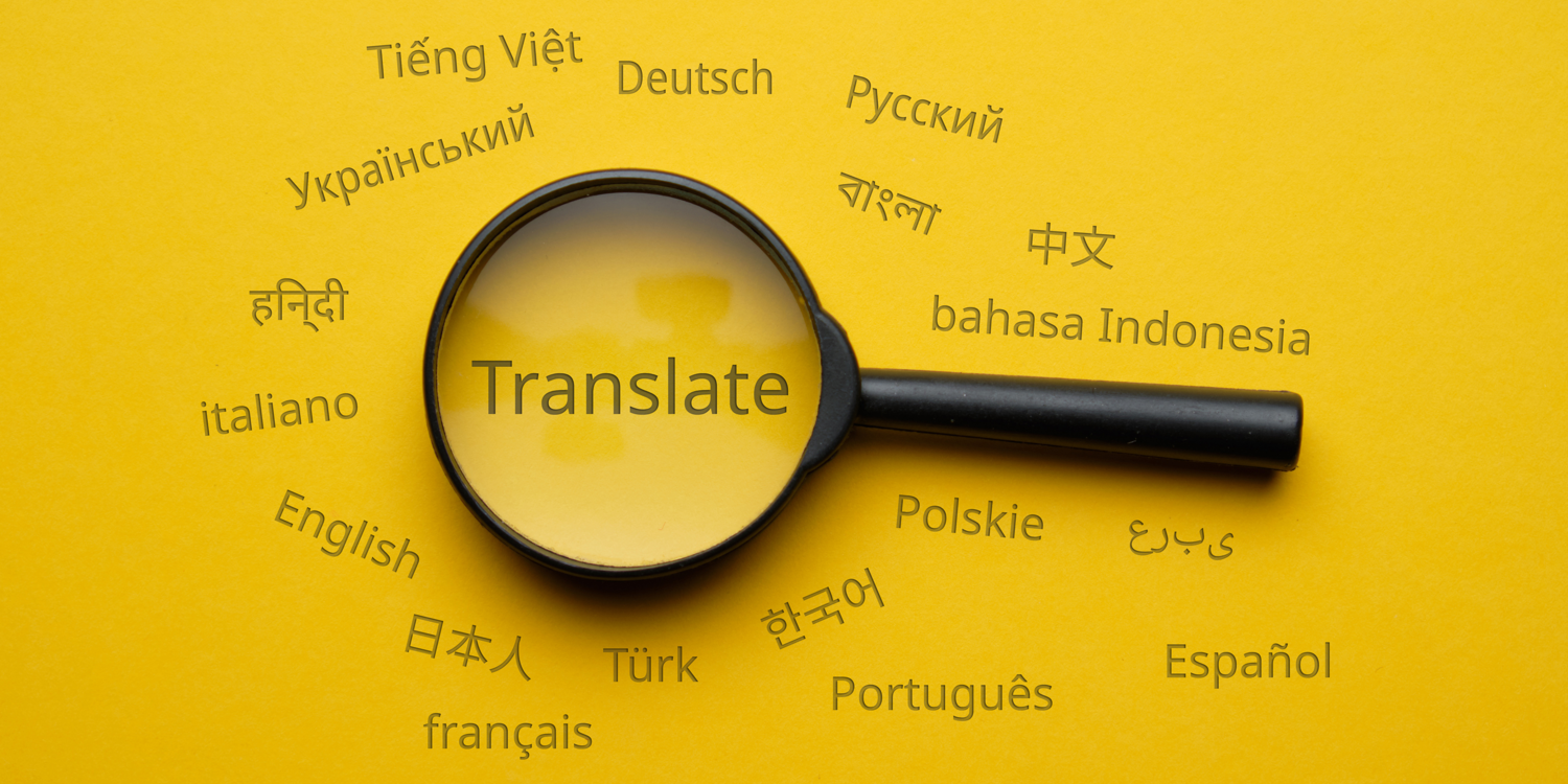einige Sprachen sind zu sehen / Mit einer Lupe wird das Wort 'Translate' vergrößert